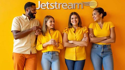 Four happy JetStream employees hanging out, socially.